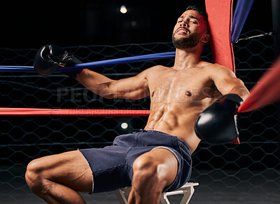 Buy stock photo Fitness, boxer and man tired in ring out corner exhausted from sports boxing match at the gym or arena. Active male in fight club, fatigue and relaxing from intense fighting sport workout or exercise