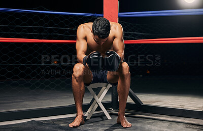 Buy stock photo Boxing ring, gloves and strong man in dark aren for fitness motivation or mma wrestling match or fighting training with light shine. Professional boxer in extreme sports for wellness, health muscles