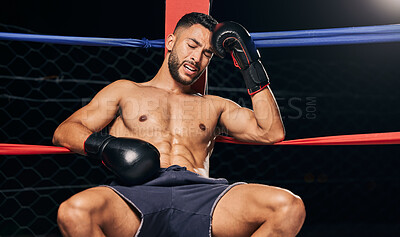 Buy stock photo Sports, boxing ring and tired frustrated boxer with head pain, injury or fatigue from exhibition competition. Defeat or failure in fight challenge, workout or training burnout from fitness exercise