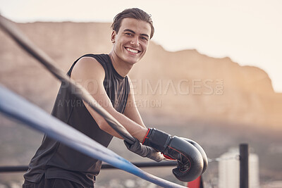 Buy stock photo Relax, boxing ring and portrait of man with gloves on break in outdoor gym for martial arts class. Fitness, wellness and kickboxing person taking rest in the fresh air while at sports  training.