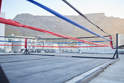Buy stock photo Outdoor, sports and empty boxing ring in the city for a wrestling competition for athletes or boxers. Outside martial art corner in the street for fitness, workout and exercise fights in south africa