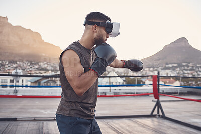 Buy stock photo Virtual reality, boxing and sports man training for fight, fitness or exhibition competition in a boxing ring. Vr headset or goggles, metaverse and boxer workout with exercise innovation gamer tech