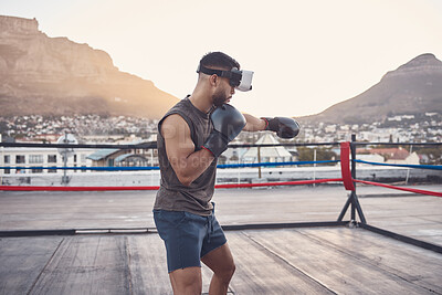 Buy stock photo VR boxing, metaverse fitness and man with innovation sports training for wellness in city, digital futuristic 3d workout and exercise with tech for health. Boxer in ring with virtual game challenge