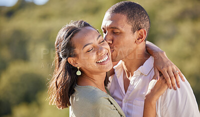 Buy stock photo Happy black woman and man couple kiss, love and dating in relationship summer nature romance date. Hug, embrace and romantic black couple smile, kissing and happiness on vacation or holiday together