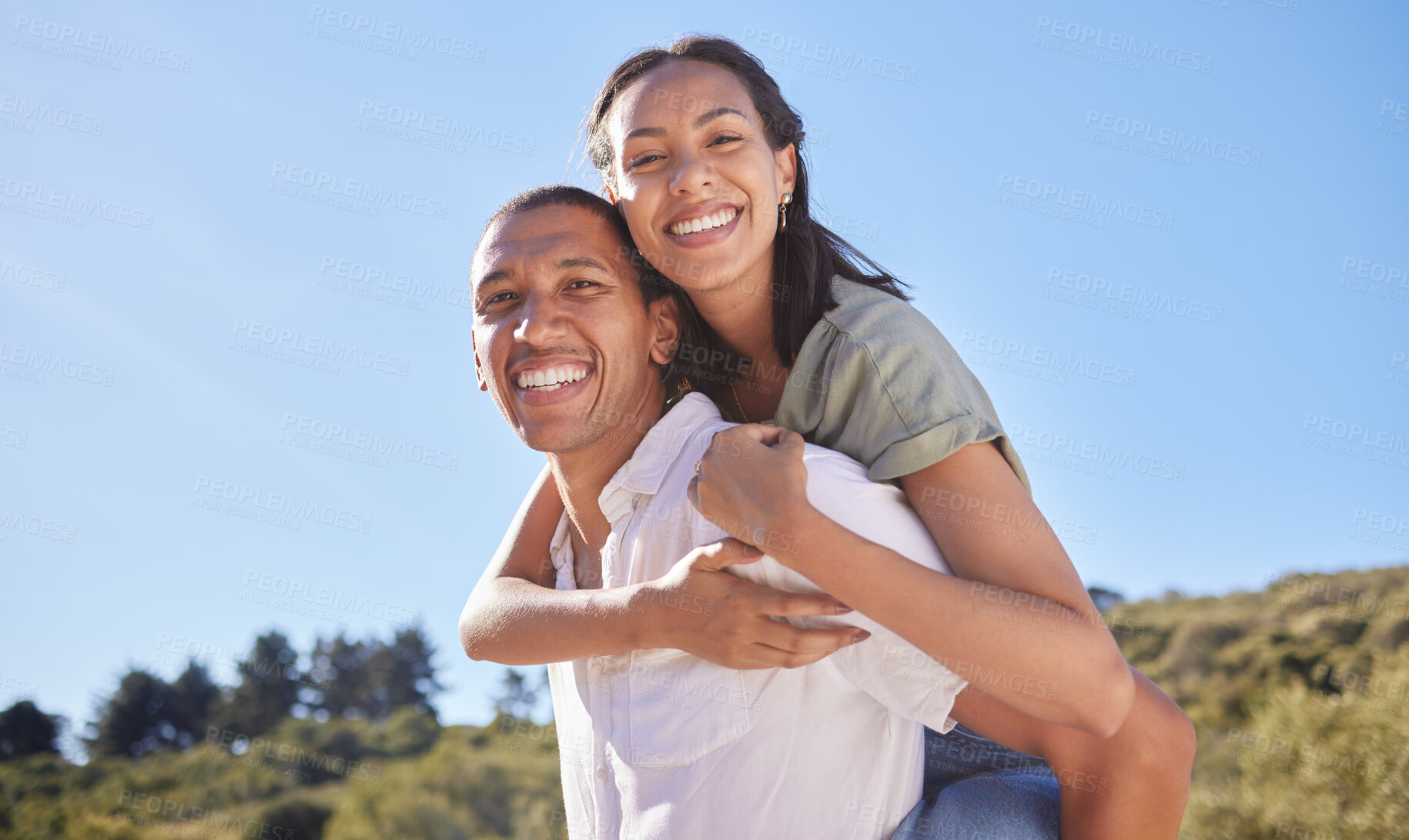 Buy stock photo Love, happy couple and travel adventure with young lovers out hiking, exploring and traveling through nature in summer. Portrait smile of latino man and woman enjoying piggyback while out for a walk