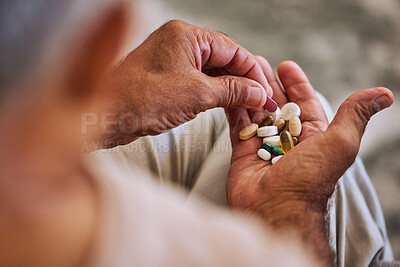 Buy stock photo Pills, medicine and healthcare of senior man taking daily capsules for chronic illness, cancer or health. Wellness, medication and sick elderl with medical drugs, vitamins or supplements in his hand