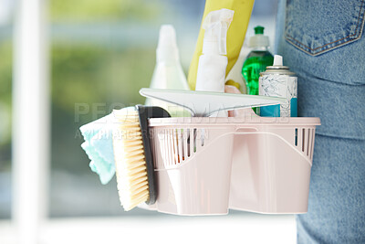 Buy stock photo Home, cleaning and chemical products in a bucket for home care work and spring clean routine. Macro of cleaner with detergent spray, bottles and tools to scrub the interior of household.