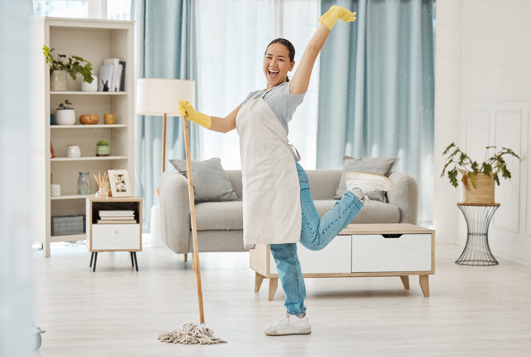 Buy stock photo Fun asian woman, mop or cleaning living room with housekeeping floor product for home cleaner service, maid or worker. Happy, smile or healthcare maintenance in bacteria spring clean of interior room