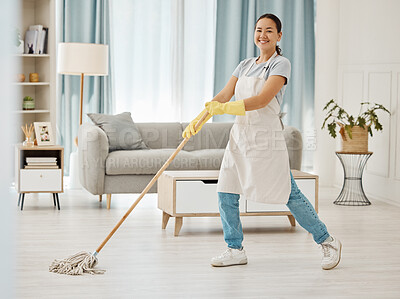 Buy stock photo Asian cleaner woman mopping and cleaning dirt and dust in lounge or living room floor in house or home. Happy Japanese housekeeping help, hygiene maid or employee tidy and spring cleaning apartment