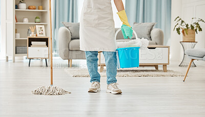 Buy stock photo Cleaning, mop and spring cleaning equipment with woman in living room for domestic, hygiene and sanitary. Maid or housekeeper with container in home for interior, house or apartment cleaning service