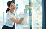 Cleaning, window and service worker woman with glass water product or chemical liquid with a smile for happy job or career. Cleaner working in modern apartment or building and scrub dirt with sponge