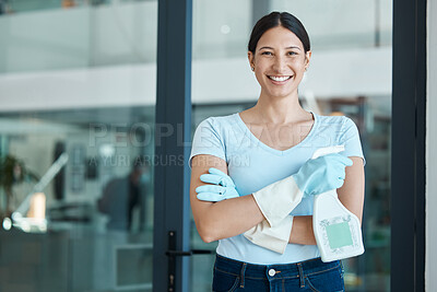 Buy stock photo Cleaning service, portrait and cleaner in an office with spray bottle of disinfectant, bleach or detergent. Happy, smile and young female worker with gloves and soap liquid done washing glass windows