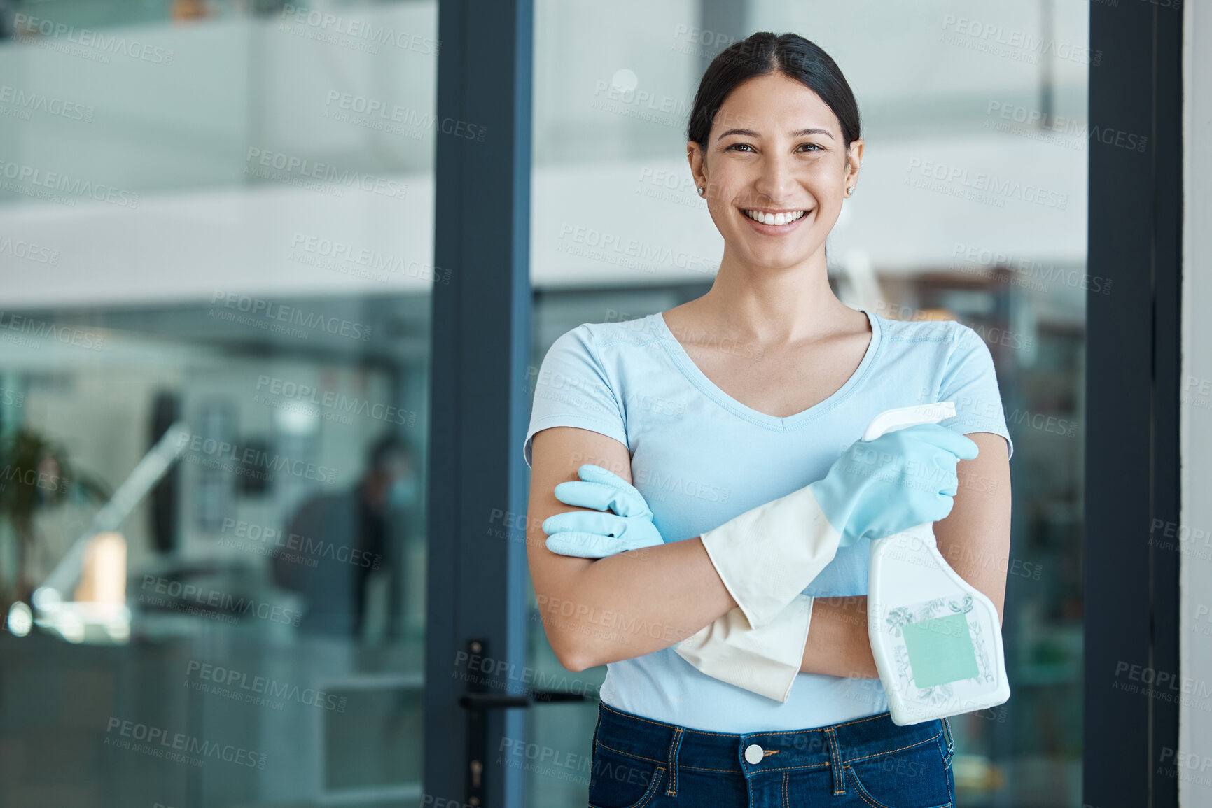 Buy stock photo Cleaning service, portrait and cleaner in an office with spray bottle of disinfectant, bleach or detergent. Happy, smile and young female worker with gloves and soap liquid done washing glass windows