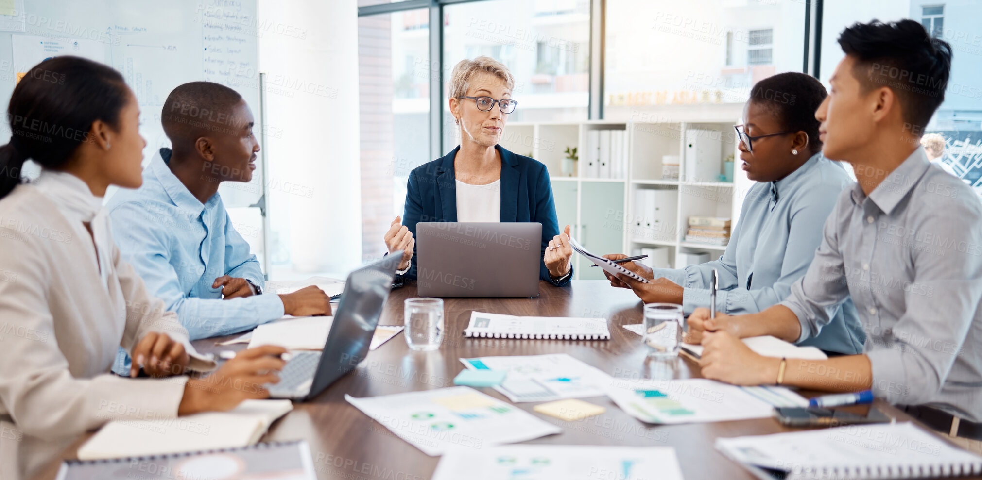 Buy stock photo Manager meeting, employee planning and finance discussion with documents in office, conversation with team and partnership at work. Business boss talking to workers about strategy and collaboration