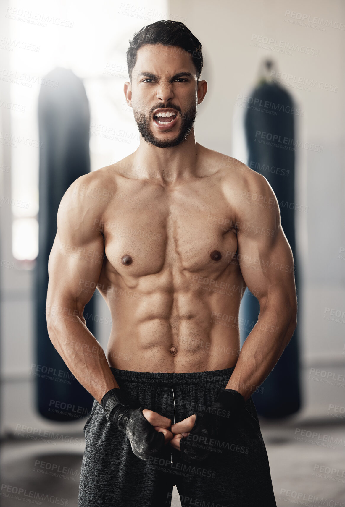 Buy stock photo Fitness, sport and man boxer with motivation, vision or exercise goals, health and wellness in gym. Powerful flexing of healthy sports personal trainer with workout for muscle training body in studio