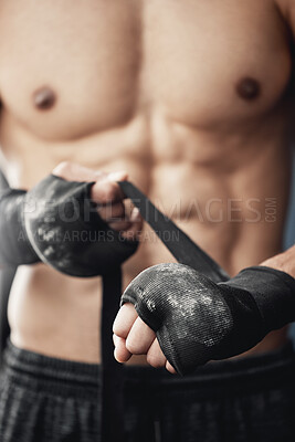 Buy stock photo Hands, wrist wrap and boxer man getting ready for tournament fitness workout in boxing gym macro. Training, fighting and mma protection bandage for injury and pain prevention from sports.