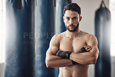 Buy stock photo Fitness, boxer and gym of a man in sports professional for strength and motivation with arms crossed. Portrait of a male in strong and confident boxing at health club by punching bag after training