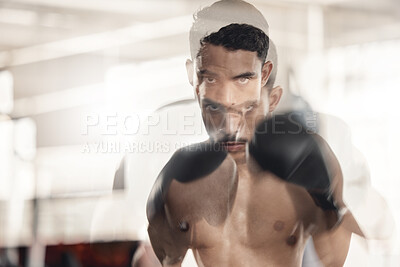 Buy stock photo Boxing, sports and fitness with motion blur and a man boxer training in a gym for health and wellness with special effects. Workout, exercise and fight with a healthy and stong male fighter in gloves