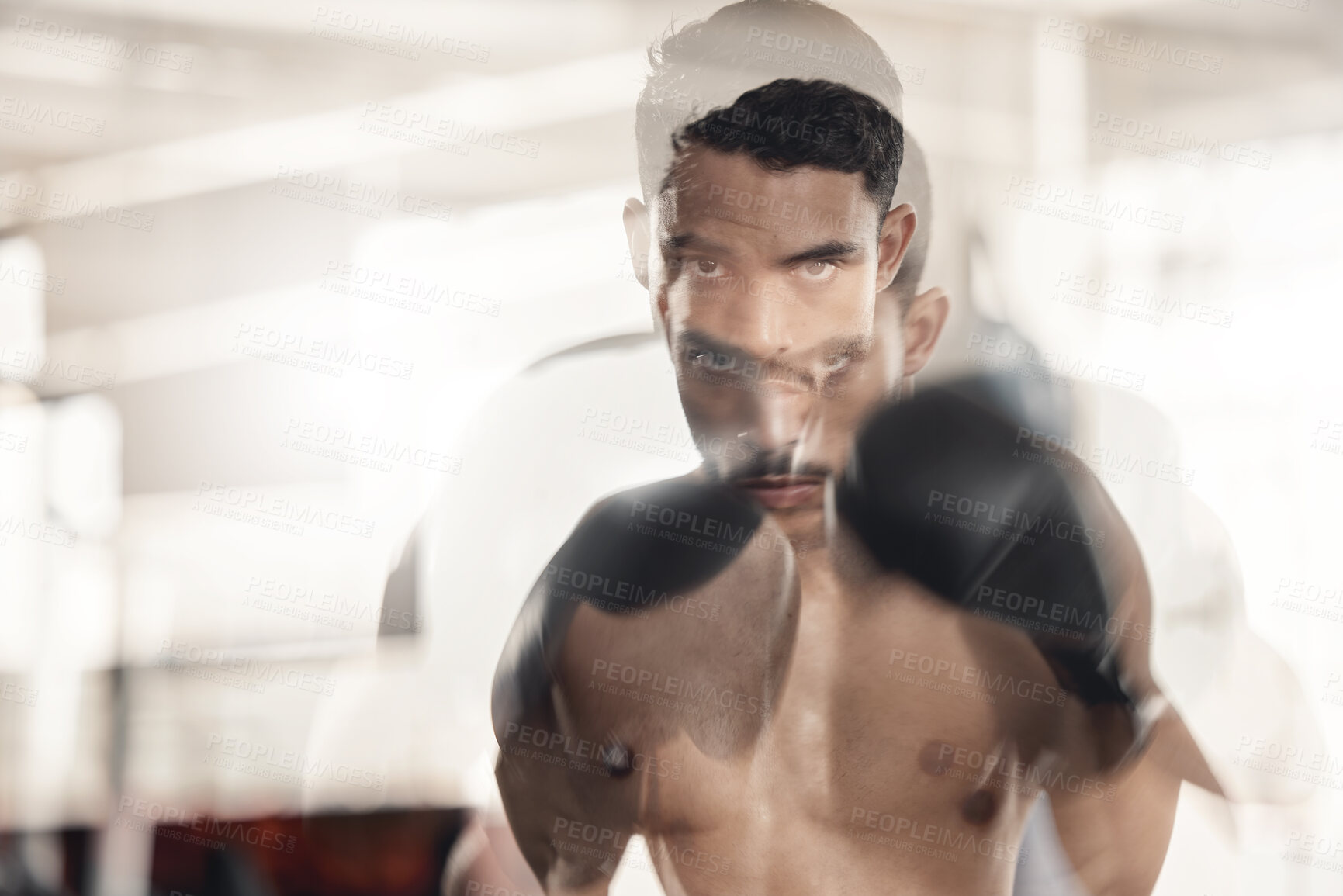 Buy stock photo Boxing, sports and fitness with motion blur and a man boxer training in a gym for health and wellness with special effects. Workout, exercise and fight with a healthy and stong male fighter in gloves