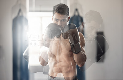 Fitness exercise with boxing gloves, sports man action training in gym and workout body motivation portrait. Strong muscular athlete boxer in sportswear, arms up in action and fight boxer punch air