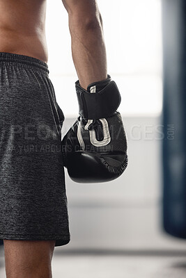 Buy stock photo Boxer, fighter glove and hand close up at sports club or gym for training with equipment for fist. Athlete sportswear for protection for mma and boxing fight or workout with safety gear.
