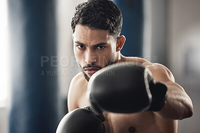 Boxing fitness, training motivation and boxer at the gym for wellness, health workout and sports exercise. Face portrait of a strong athlete with fist power during cardio fight and competition
