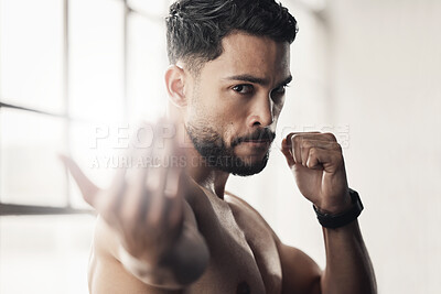 Buy stock photo Fighter, sport and boxing portrait of man, athlete and strong boxer training, exercise and muay thai in gym or fitness club. Serious, health and fighting professional doing a workout for endurance
