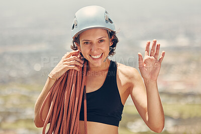 Buy stock photo Rock climbing, rope and woman portrait happy to challenge her fitness and hiking outdoors in nature adventure. Helmet, smile and mountain climber girl waving and ready for exercise and sports workout