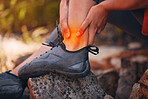 Ankle, pain and injury with a hiker suffering with a sprain, fracture or swelling of a leg or foot joint. Cgi, special effects and overlay with the hands of a male hiking outside in nature alone