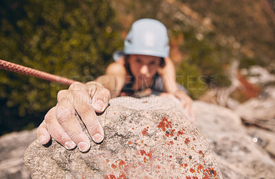 Buy stock photo Woman, hand and rock climbing with rope on mountain, hill or remote hiking for workout, training and exercise. Fitness person in energy, risk and danger sports for wellness health in nature