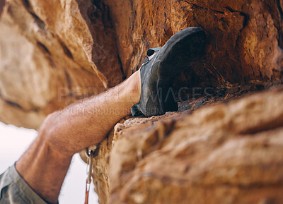Buy stock photo Leg of man climbing rock, mountain or stone for workout, adventure or exercise. Bouldering, sport and fitness of male climber training outside, countryside or nature mountaineering, hiking or climb.