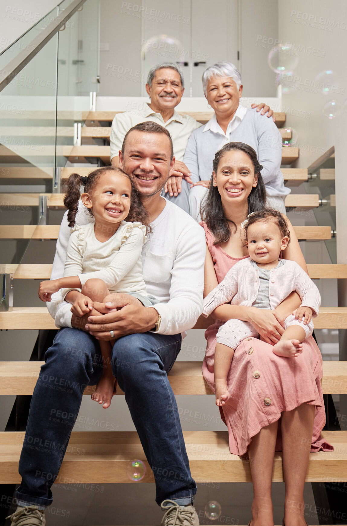 Buy stock photo Kids portrait, happy family and parents with grandparents on stairs, smile at birthday celebration and love in house together. Elderly grandmother and man with children on steps to celebrate holiday