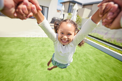 Buy stock photo Happy, motion and child spinning on arms of parent in backyard garden for childhood, fun and bonding. Family, happiness and youth with young girl swing in a circle with hands of father at home