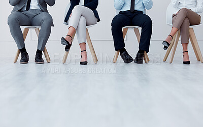 Buy stock photo Business people waiting at recruitment company for a job interview or hiring meeting. Closeup of a group of employees sitting on chairs in a waiting room or office to join a corporate team project.