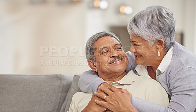 Buy stock photo Relax, retirement and senior Mexico couple on sofa at home enjoying free time with smile, hug and love. Happy, comfortable and relationship of elderly man and woman on couch in living room together