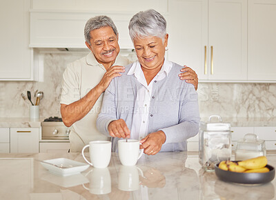 Buy stock photo Coffee, couple and love with a senior woman and man enjoying retirement while together in the kitchen of their home. Happy, smile and romance with an elderly male and female pensioner making tea