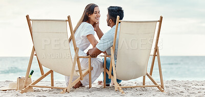 Buy stock photo Happy, travel and love of a couple from India on a beach, ocean and sea vacation. Happiness of Indian people smile with a peace, relax and calm mindset together by the waves, sand and water in nature