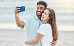 Couple, beach selfie and smile for happy travel fun, freedom day and relaxing summer vacation outdoors. Photos celebrate love hug, sun and young people on holiday, romance together and honeymoon date
