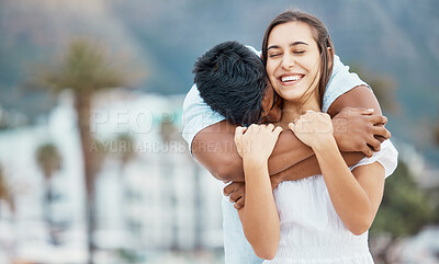 Buy stock photo Love, hug and couple in happy relationship outdoor with city bokeh for holiday, vacation or weekend outing. Care, affection and carefree man embrace woman or people with happiness together