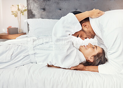 Buy stock photo Couple holiday, hotel bedroom and happy on luxury vacation for wedding celebration, smile for love on bed and happiness hug together in house. Man and woman relax with romance in house apartment