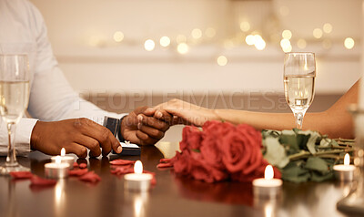 Buy stock photo Love, engagement and couple holding hands with wedding ring at restaurant table for proposal, date and celebration. Romance, champagne and happiness with diamond jewellery for marriage