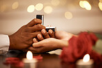 Ring, love and marriage proposal with couple on a romantic date and holding hands while asking the big engagement question. Commitment, anniversary and gift from a man to fiance woman to be engaged