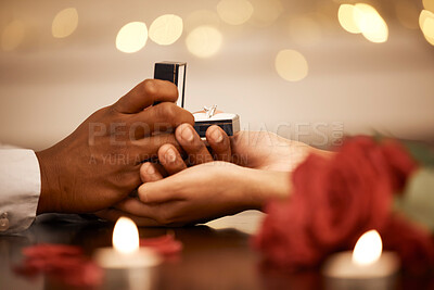 Buy stock photo Ring, love and marriage proposal with couple on a romantic date and holding hands while asking the big engagement question. Commitment, anniversary and gift from a man to fiance woman to be engaged