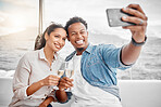 Couple, selfie and toast on a yacht with a phone for celebration, anniversary and luxury together. Champagne, happy and sailing with young man and woman, smile for a picture for summer holiday