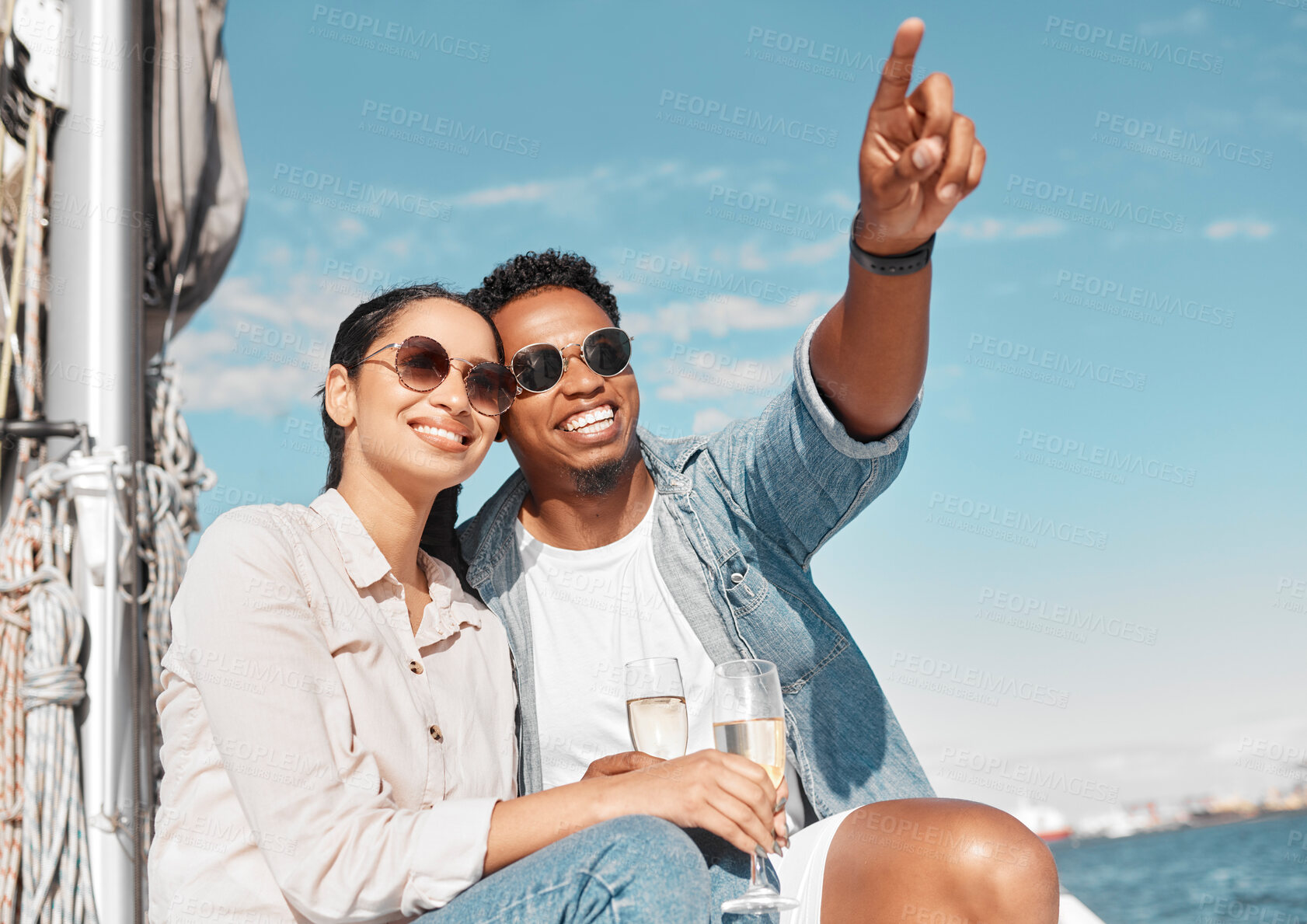 Buy stock photo Couple, champagne and pointing on luxury yacht for summer holiday, anniversary celebration and travel in Monaco. Smile, happy or love bond man and woman on ocean or sea water boat for relax honeymoon