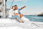 Couple, love and yacht with a man and woman out at sea or on the ocean for romance with nature in the background. Happy, trust and care with a young male and female on a boat in the water together
