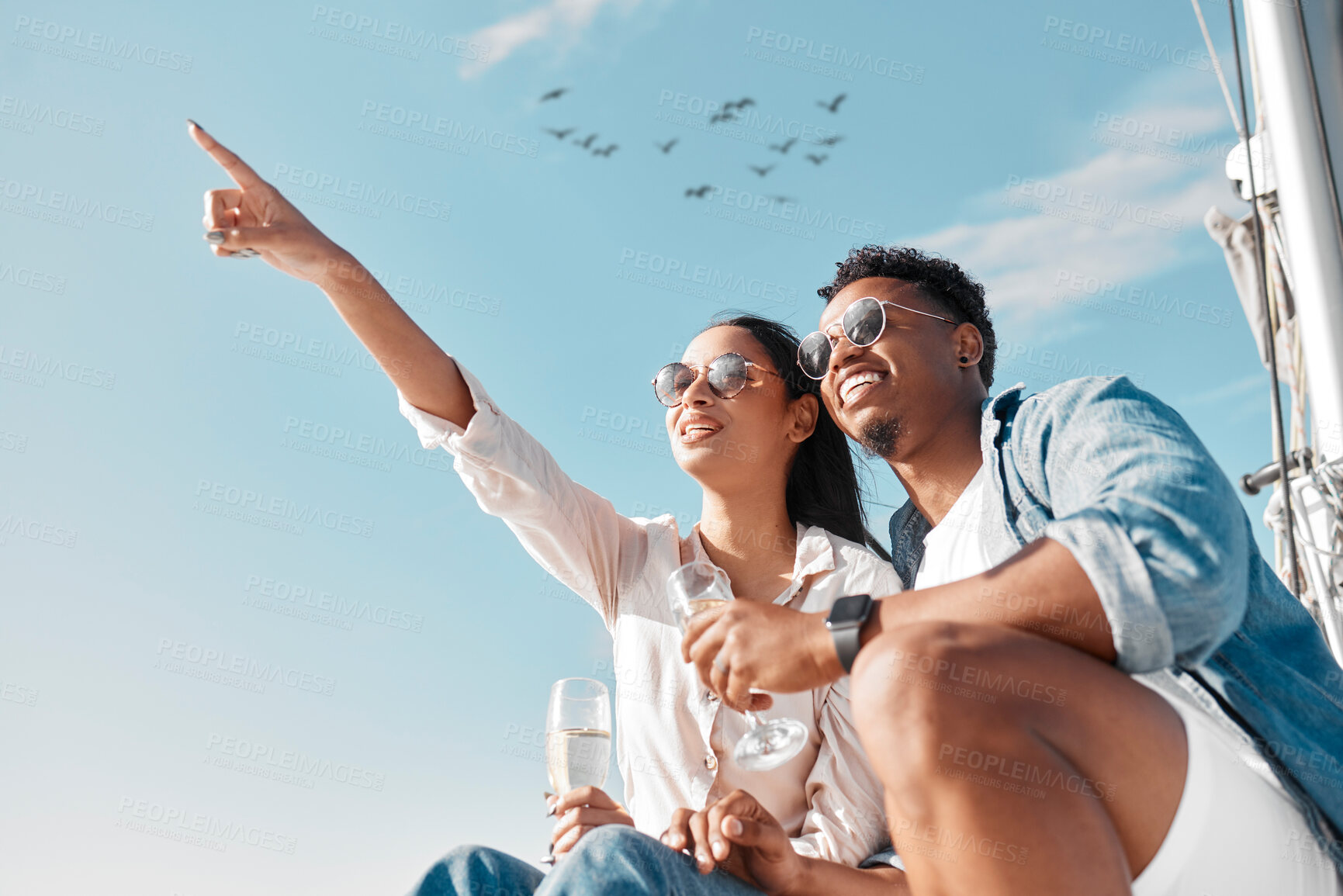 Buy stock photo Couple travel, champagne drink and date on yacht, wine on wedding holiday in Greece and happy in celebration of marriage on cruise vacation. Man and woman relax with glass of alcohol on boat