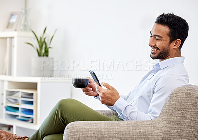 Buy stock photo Business man, entrepreneur or ceo with phone drinking coffee while relax, smile and communication on social media in office. Businessman, leader or manager with smile, happy or success on smartphone