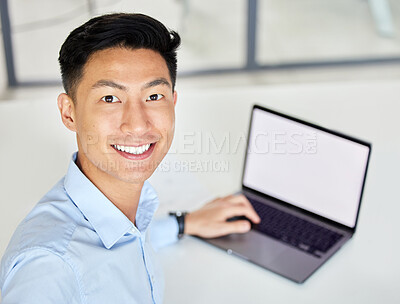 Buy stock photo Laptop, happy and businessman taking an office selfie at work and typing an email with mockup space at desk. Smile, joy and Asian worker proud of new job sharing a picture online on social network