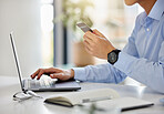 Hands, laptop and credit card with a business man or accountant working in finance or banking online. Accounting, ecommerce and and shopping with a male employee at work by a desk in the office